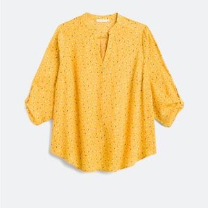 Yellow floral blouse with a relaxed fit